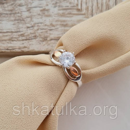 Каблучка срібна із золотою напайкою та білим круглим цирконом