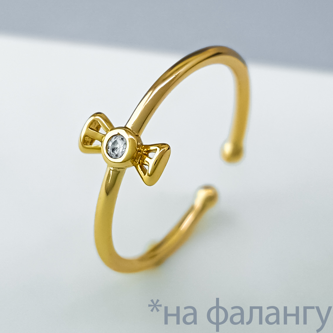 Кільце на фалангу "Ажурний бантик" з цирконієм, р.14,5; медичне золото Xuping 18К