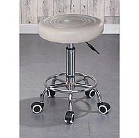 Стілець для майстра манікюру , педикюру і перукаря без спинки слонова кістка, прогумовані колеса..