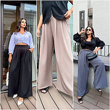 Жіночі брюки палаццо з кишенями тканина костюмка мають високу посадку розміри батал