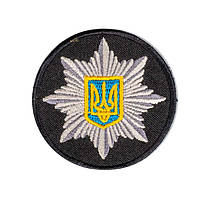 Кокарда поліцейська (на липучці) чорна 6см