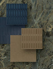 Керамограніт Marazzi Rocking Multicolor Strutt у зеленому кольорі вдало поєднується з коричневою та синьою пліткою маленького формату.