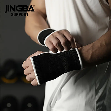 Підтримуючі напульсники-фіксатори для зап'ястя одного розміру для занять спортом. Колір чорний. Набір 2 шт