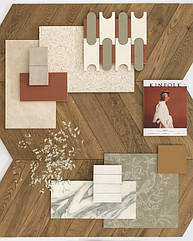 Ідеальне поєднання матеріалів: від керамограніту з ефектом дерева VERO CHEVRON ROVERE до білого облицювання з колекції MOMENTI, включаючи альтернативну мозаїку, що нагадує головоломку, та декор з ефектом шпалер.