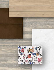 Плитка з ефектом металу GRANDE METAL LOOK CORTEN у комбінації з MYSTONE TRAVERTINO SILVER доповнена керамогранітом з ефектом дерева OLTRE NATURAL та декором із дрібними квітами CROGIOLO RICE GARDEN.