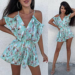 Жіночий комбінезон-ромпер в квітковий принт: низ шорти та вільний верх з вирізом та відкритими плечима