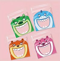 Пакети асорті Монстр зубастик подарункові прозорі прозорі з липкою стрічкою фасувальні 14х14х3 см набір 10 шт