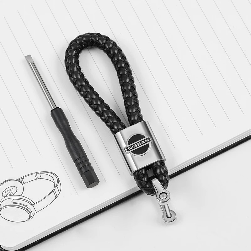 Брелоки з логотипом Nissan. Шкіряні брелоки для ключів на авто злого Ніссан. Автомобільні брелоки, фото 1