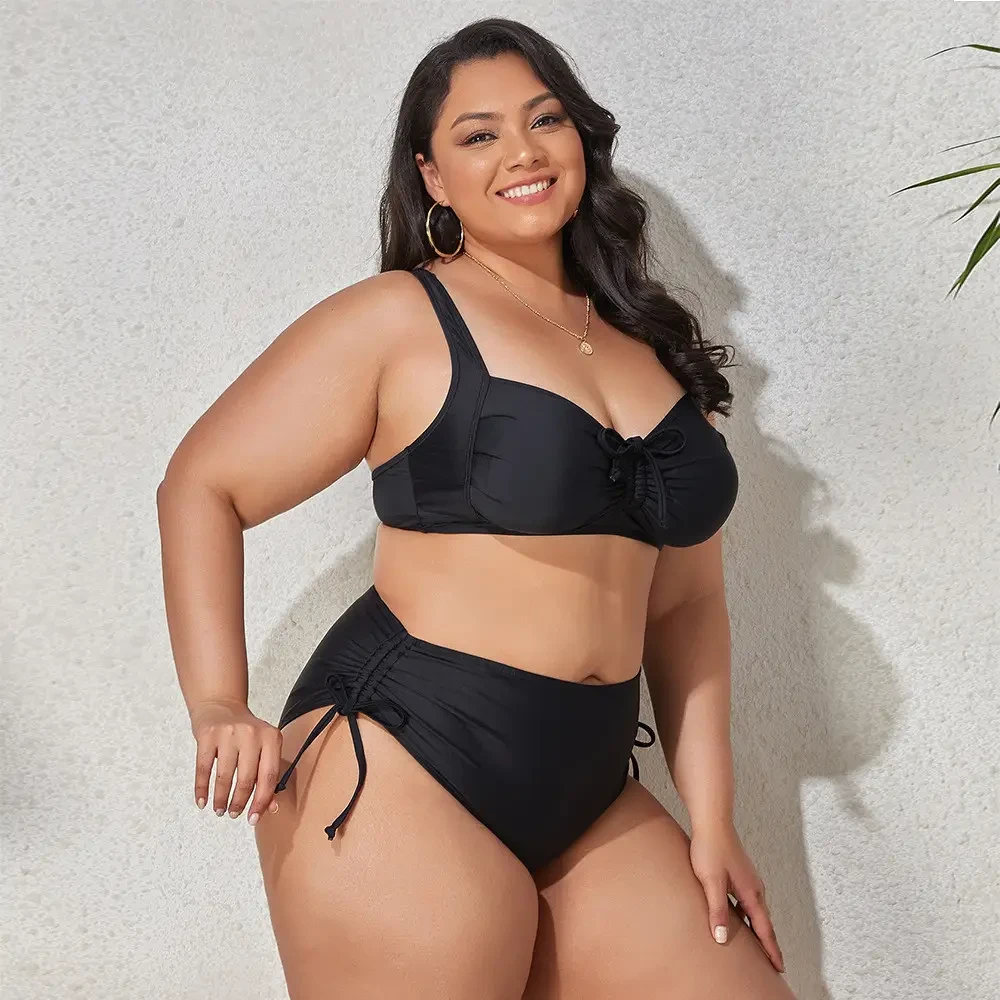 Чорний роздільний купальник із високими трусиками на затяжках