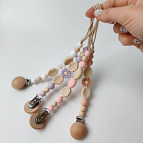 Тримач для пустушки силіконовий Квіточка з дерев'яною кліпсою