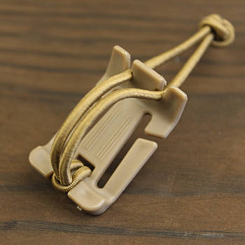 Кліпса універсальна на систему MOLLE Coyote