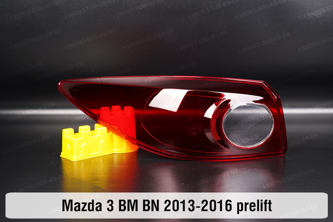 Скло заднього ліхтаря зовнішнє в крилі Mazda 3 BM BN (2013-2016) дорест ліве