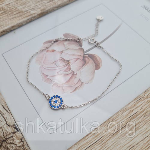 Срібний браслет з круглою підвіскою та білими і блакитними фіанітами