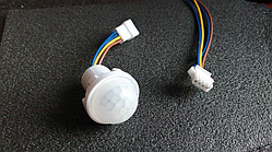 Датчик руху 220 В