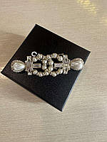 Брендова брошка