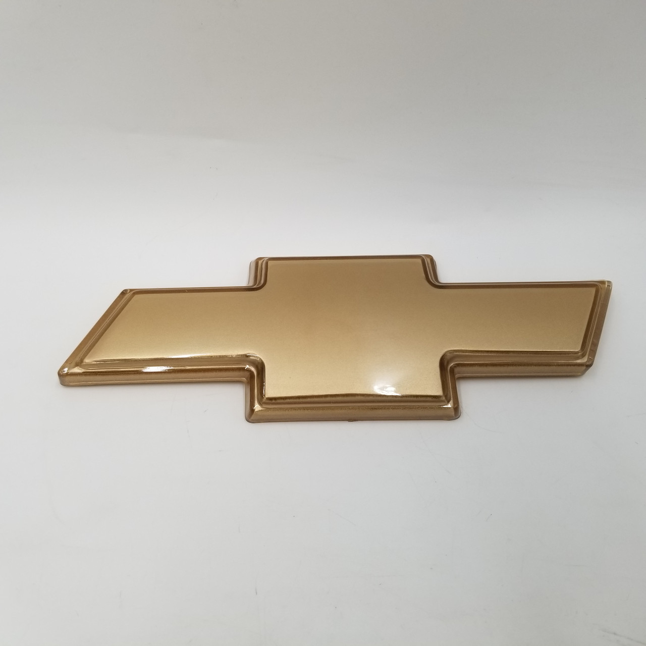 Знак крест на передню решітку Авео Т-250 grog Корея