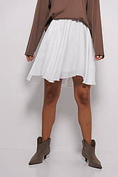 Жіноча коротка шовкова спідниця з хвилястим низом у білому кольорі
