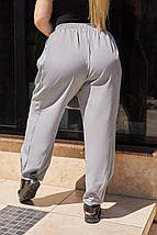 Зручні жіночі штани з якісної та приємної тканини костюмка на поясі резинка розміри великі, фото 4