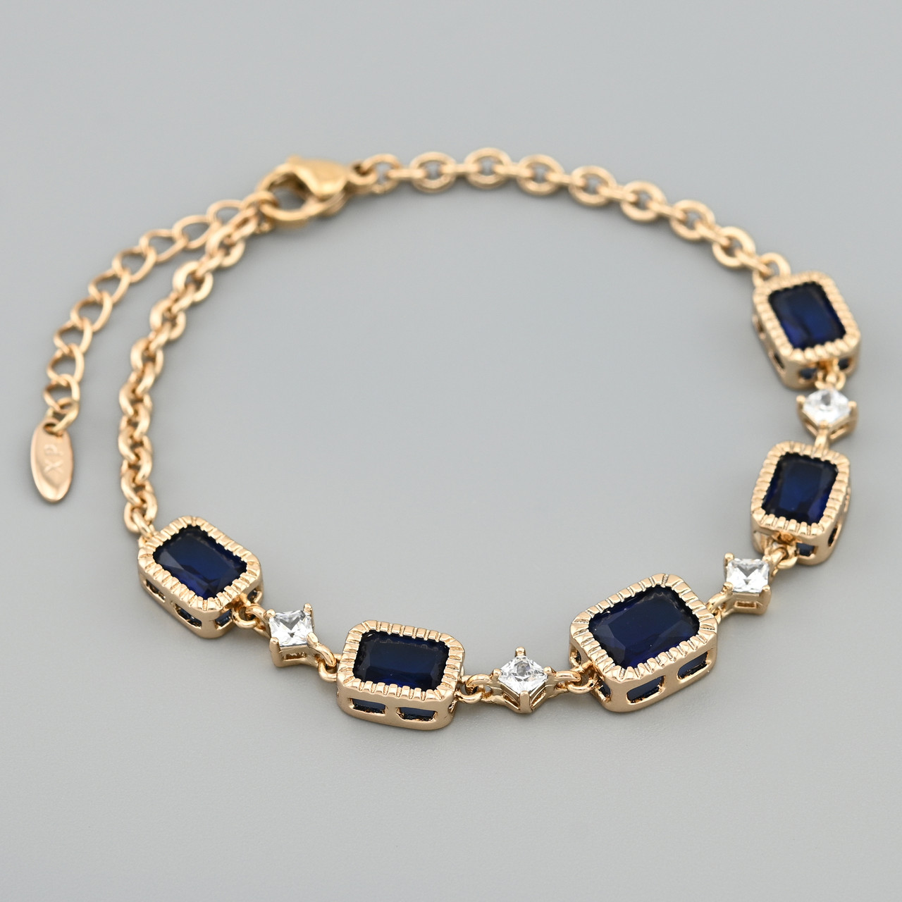 Браслет Витонченість форм 45929 ширина 3 мм сині фіаніти позолота 18К довжина 17+3, фото 1