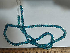 Нимистини бите скло яскраво-блакитний діаметр 6 мм на нитці