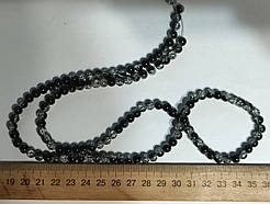 Нимистини бите скло коричньовий діаметр 6 мм на нитці