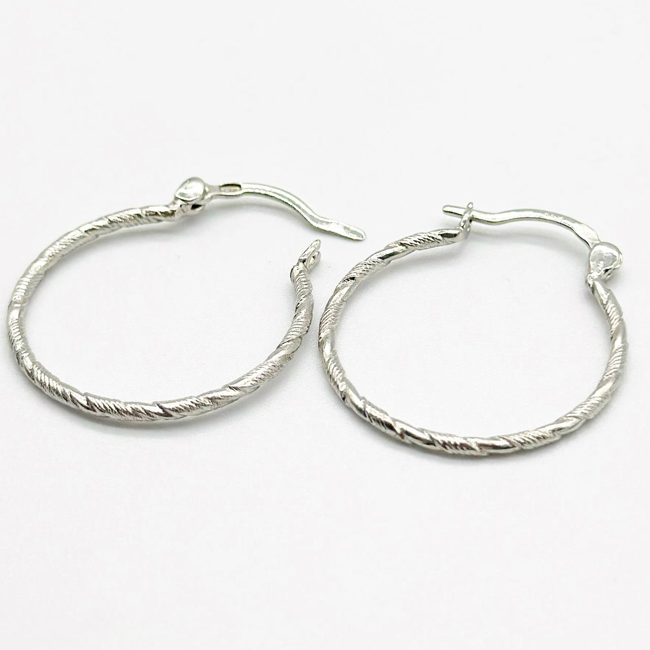 Срібні сережки родовані