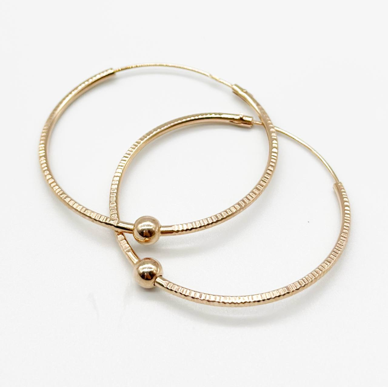 Срібні сережки позолочені