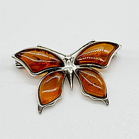 Срібна брошка зі вставкою бурштин