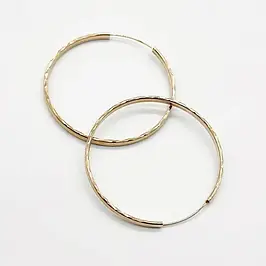 Позолочені сережки-колічки