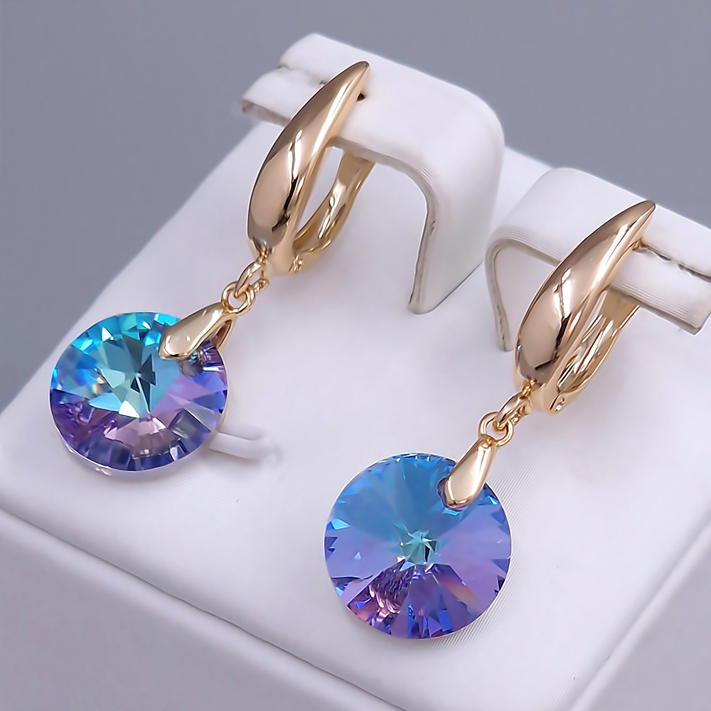 Сережки XР. Позолота 18К. Камені: Swarovski ніжно-синій хамелеон. Довжина: 36 мм. Ширина: 12 мм
