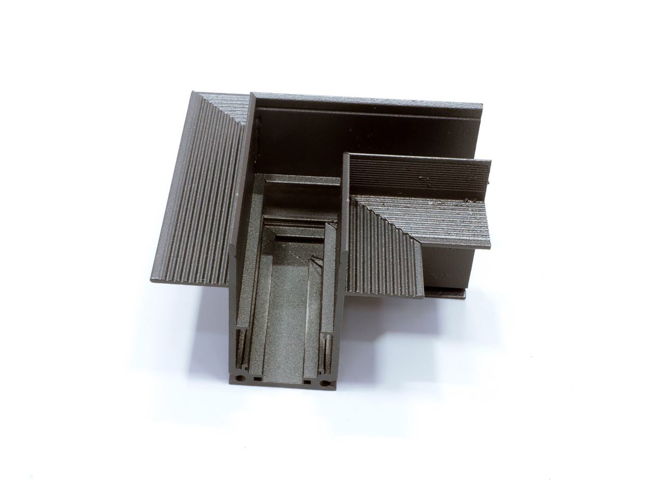 Кутовий з'єднувач для вбудованого магнітного треку