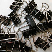 Канцелярські затискачі. Біндери.