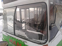 Замена лобового стекла MAN SL 202  с двух половинок