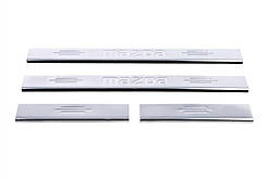 Накладка на пороги Carmos (нерж) V-1 2 накладки, з написом V-1 для Mazda 3 2009-2013 рр