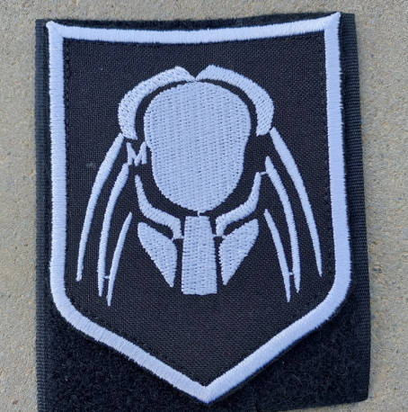 

Шеврон Хищник