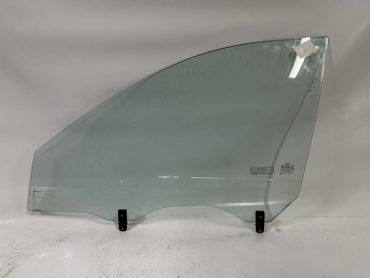 Скло KIA CERATO (2004-2009) переднє опускне ліве (оригінал) (вир-во Hyundai/Kia)