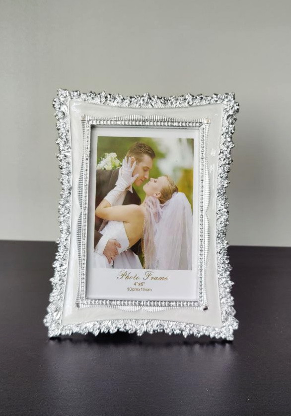 Пластикова фоторамка 10*15см (біла) 0722.003