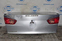 Замок кришки багажника Mitsubishi Lancer X 10 07-15 (б/у)