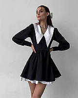 Жіноча коротка чорна сукня з білими вставками. Чорно-біла міні сукня з довгим рукавом та коміром.