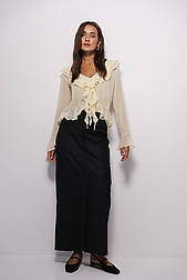 Жіноча довга спідниця в діловому стилі з імітацією кишень