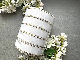 Стрічка репсова з люрексом золото 2,5 см, 25 ярд оптом 5 рулонів білого кольору блоком