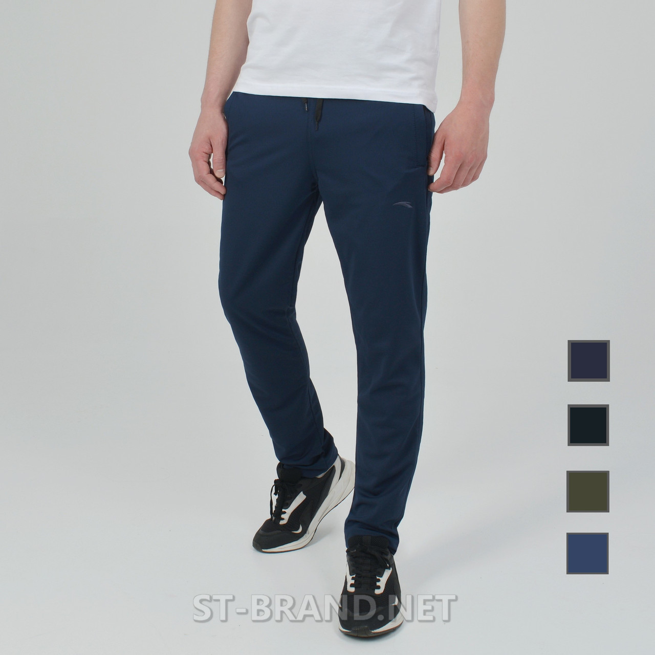 46-56. Якісні та зносостійкі чоловічі спортивні штани із трикотажу лакости - темно-сині