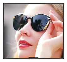Окуляри жіночі сонцезахистні