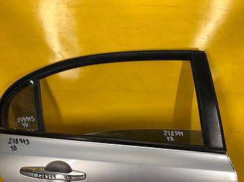 Скло дверей HONDA CIVIC 4D 06-11 задн. прав. (б/у)