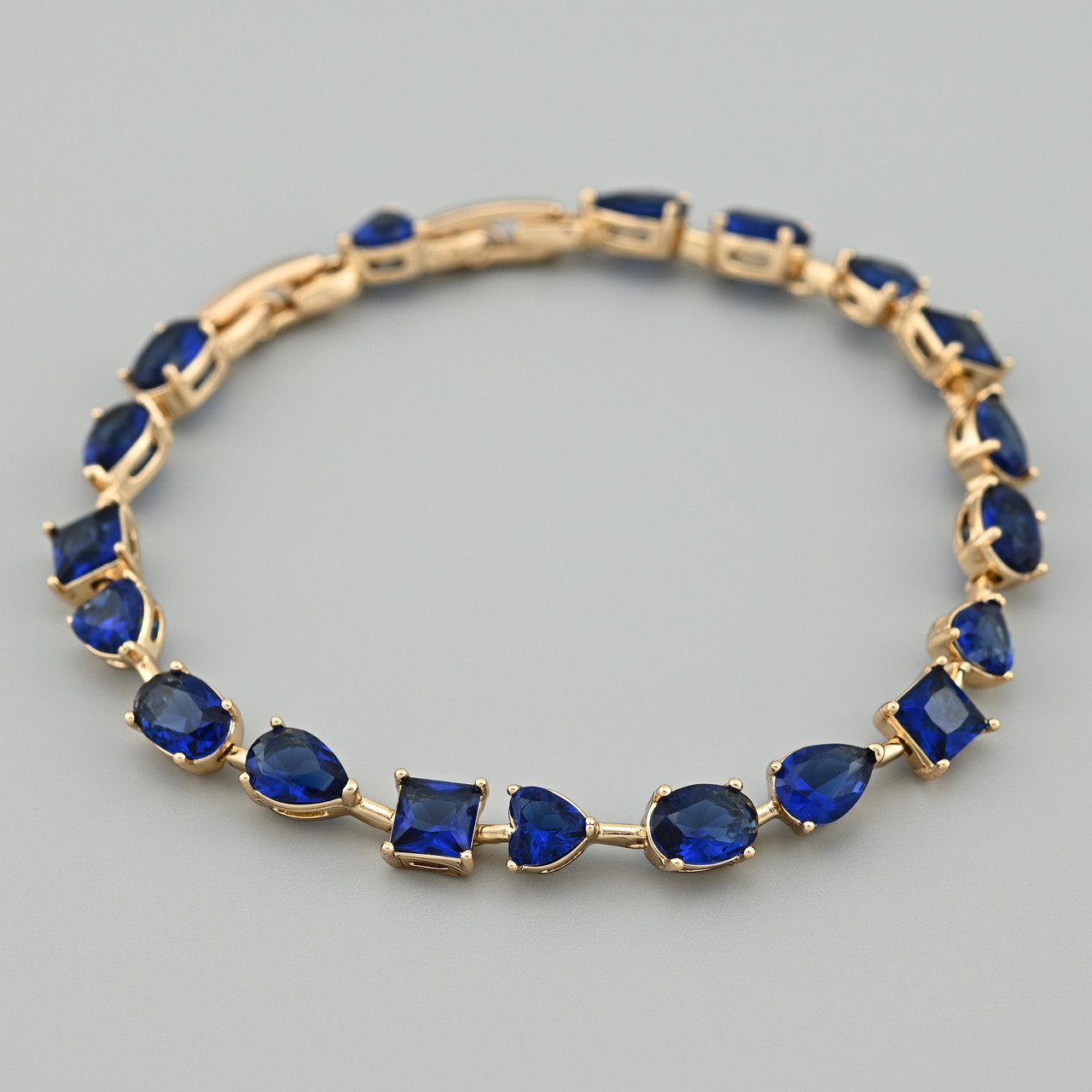 Браслет Раріті 46008 ширина 5 мм сині фіаніти позолота 18К довжина 16+2, фото 1