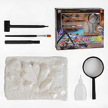 Набір розкопок динозаврів 1112 C+, гіпсовий блок, інструменти, збільшувальне скло, пляшечка для води