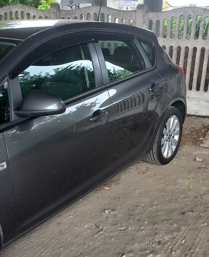 Вітровики, дефлектори вікон Opel Astra J сед/хетч 2010-2015 (скотч) Sunplex