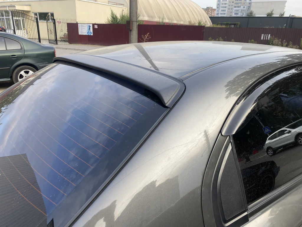 Дефлектор заднього скла Chevrolet Aveo II, Vida (T250) седан 2006-2012 (скотч) ANV.Козирек, спойлер скла