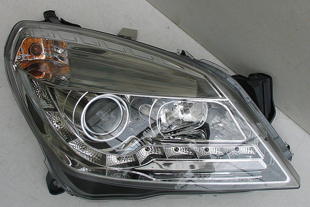 Opel Astra H оптика передня хром (HU318E1-00-1-E-00)