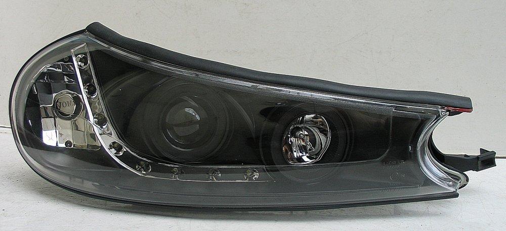 Ford Mondeo 2 оптика передня чорна (HU257E-00-1-E-01), фото 1